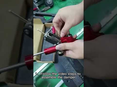 Charger la vidéo: Stabilisateur d'amortisseur de direction de scooter électrique - Pièces de scooter électrique pour scooters ZonDoo